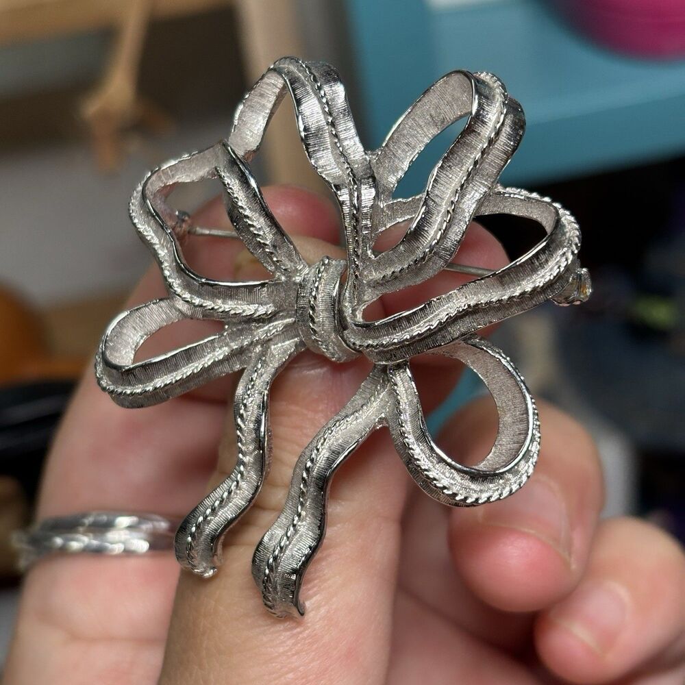 Monet Silver Tone Ribbon Bow Brooch Textured Openwork 2” Vintage Pin